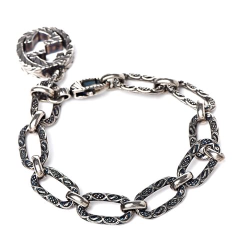 silver bracelet with interlocking g gucci|Gucci sterling silver charm bracelet.